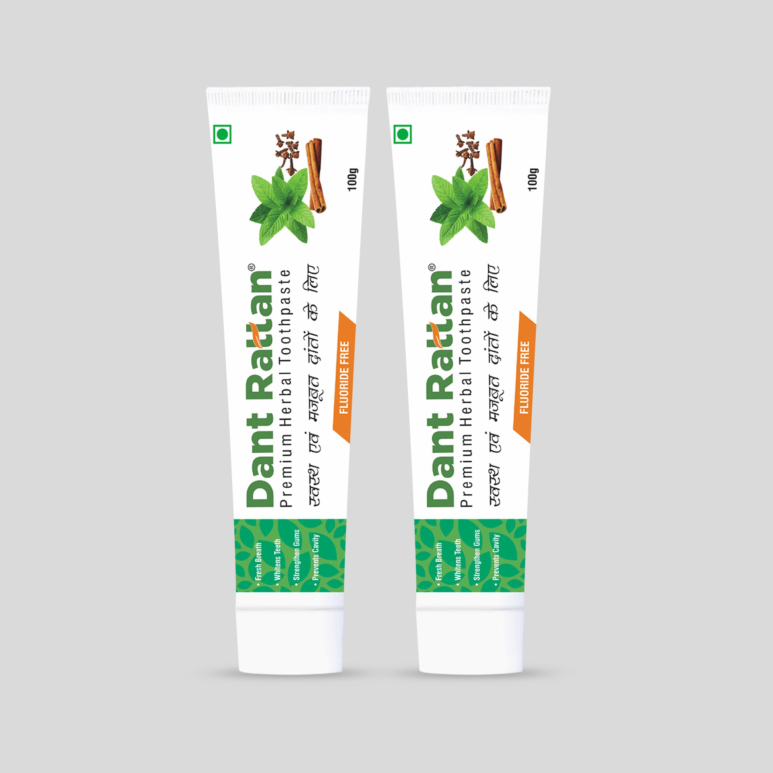 Pack of two herbal toothpastes for natural whitening and gum protection.